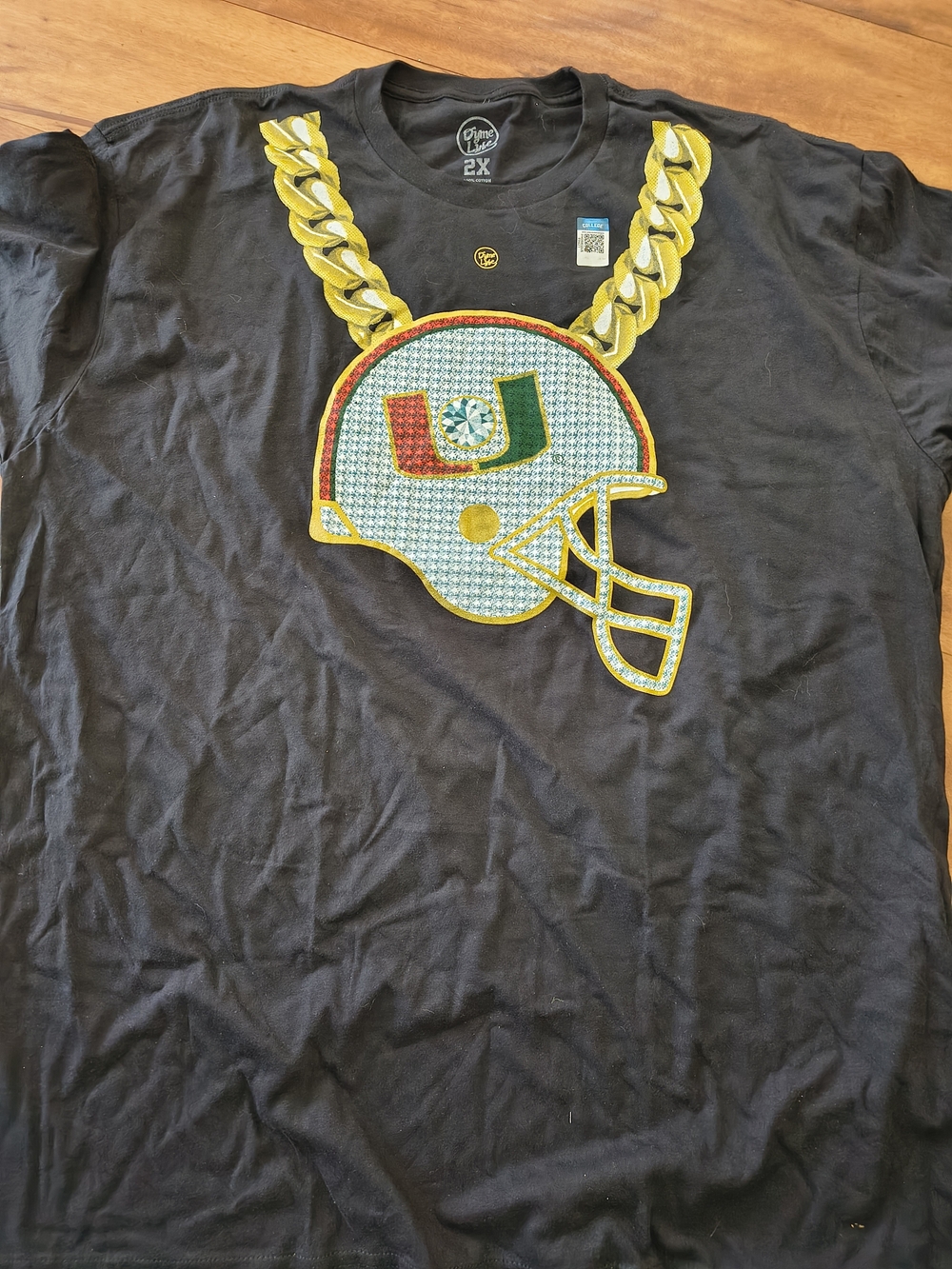 miami Black Tee with Gold Chain and Helmet Graphic